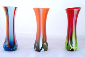 Row of three different contemporary glass tulip vases hand made in Ireland and for sale by Glass Art Ireland