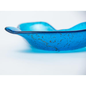 Blue heart shaped glass bowl in iridised rainbow on turquoise - contemporary glassware made in Ireland by Glass Art Ireland. Photo reference 4007
